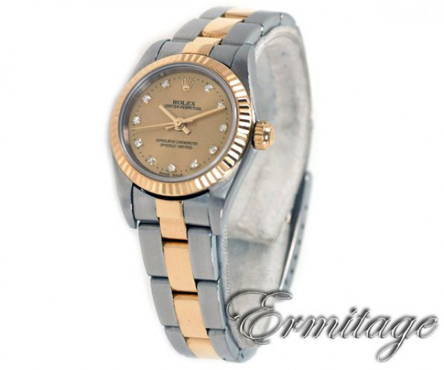 Rolex 76193 Yellow Gold & Steel on Oyster, Fluted Bezel Champagne Diamond Dial